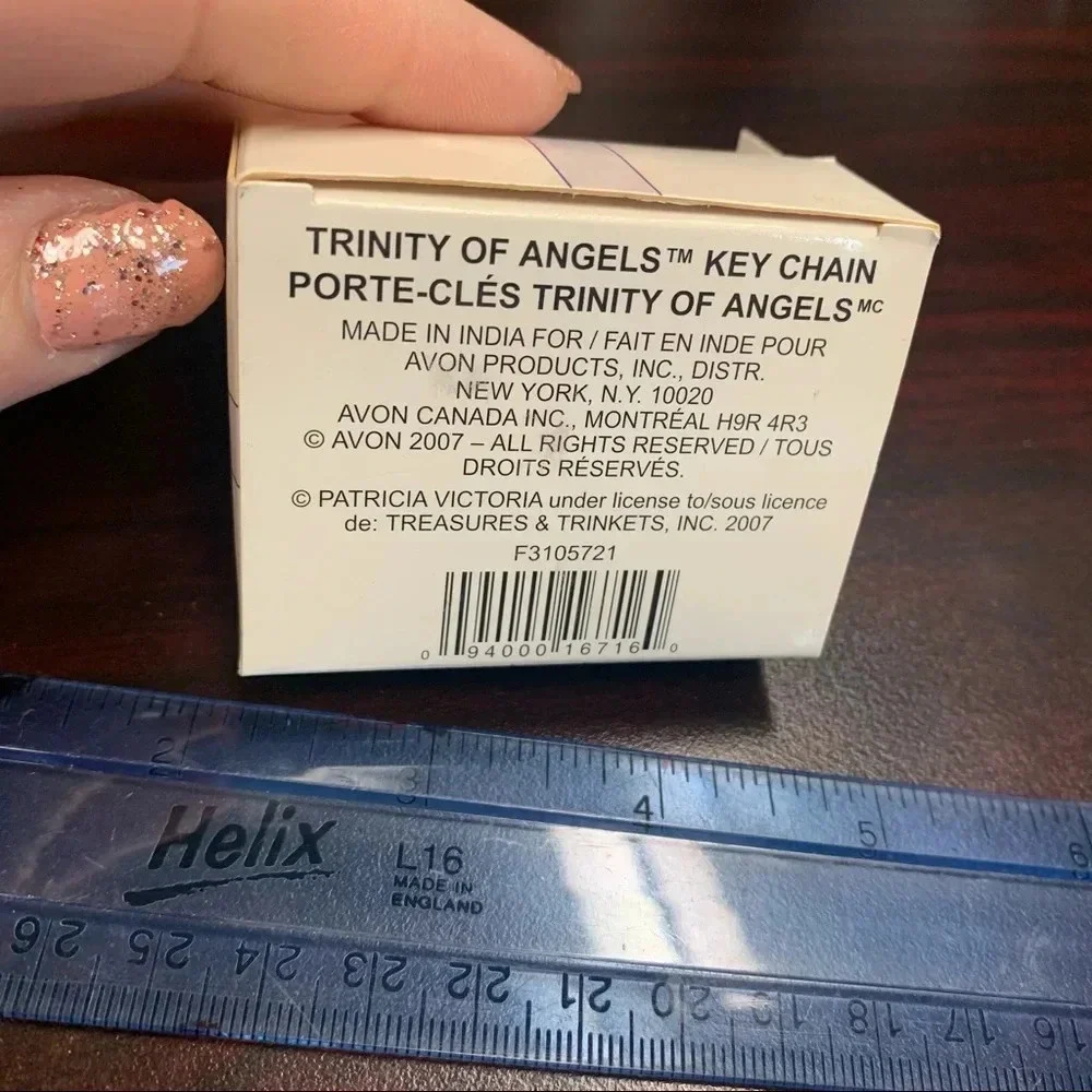Avon trinity of angels key chain silver tone 4 inches long
